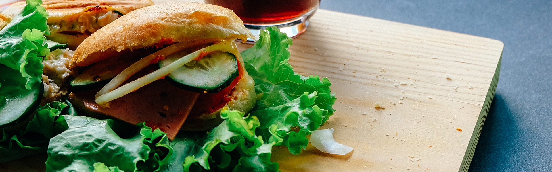 Healthy sandwich meal on cutting board.
